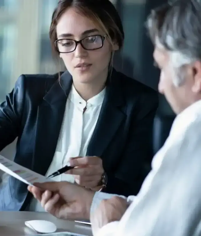 Woman showing something on peace of paper
